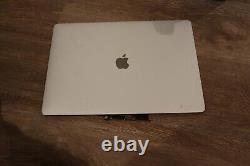 Three Apple Macbook Pro 2017 Pro 15 in LCD Displays (Silver and Space Grey)